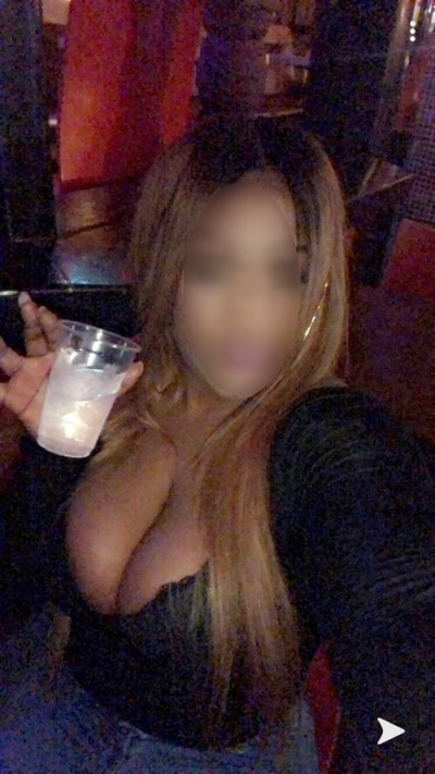 Sian having a drink on a night out