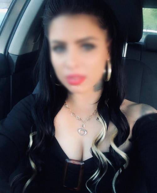 Diane looking hot as she shows off her cleavage in her car