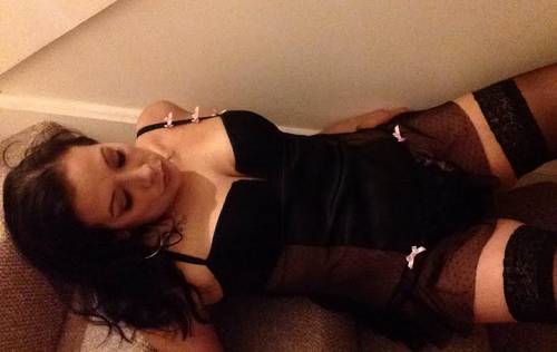 Alexis on the floor in black lingerie